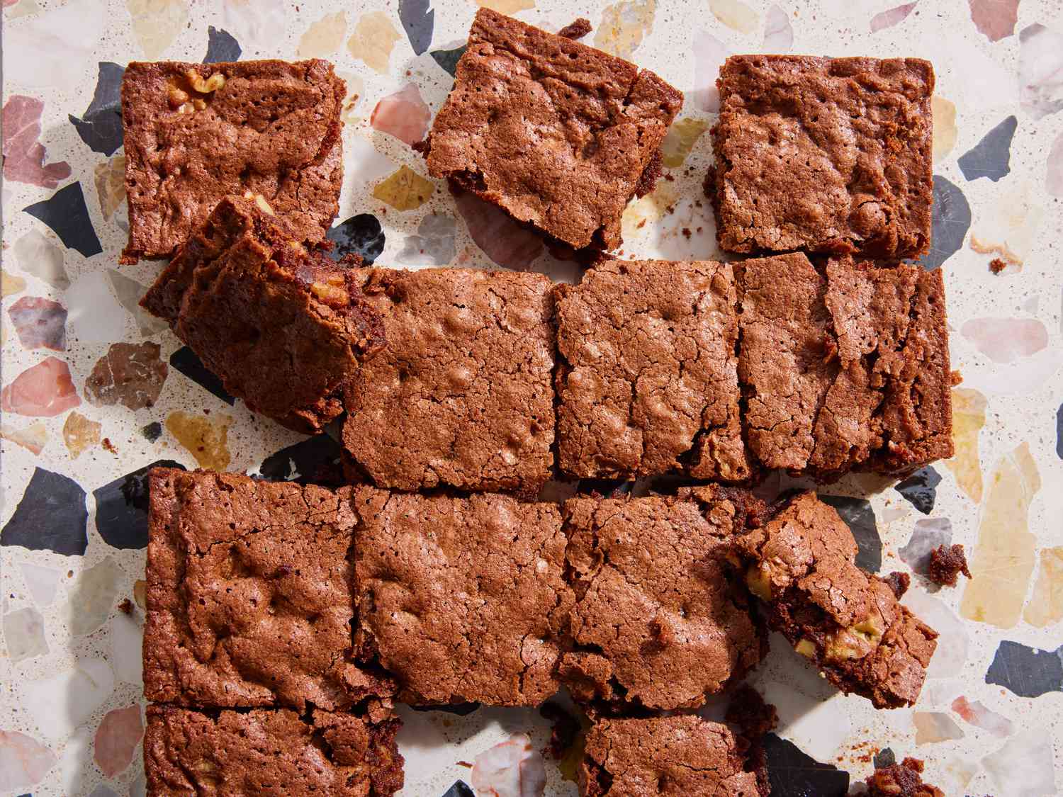 a super close up, overhead view of brownies cooled and cut into squares.
