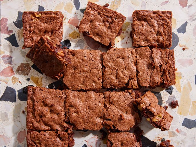 a super close up, overhead view of brownies cooled and cut into squares.
