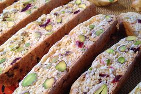 close up view of Cranberry Pistachio Biscotti on a baking sheet