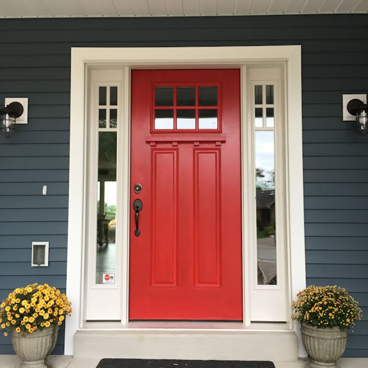 red front door paint on a dark colored home